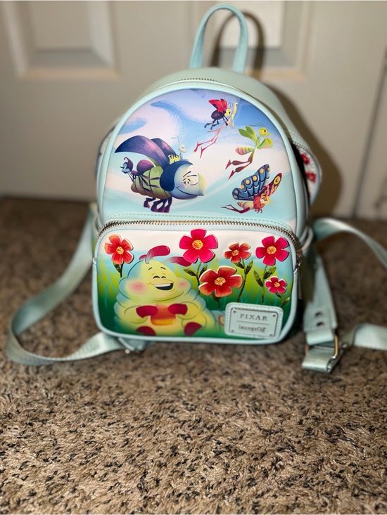 bug's life mini backpack Loungefly Disney Pixar A Flik Cosplay - 707 Street Exclusive and PVC detailing Removable headband Sturdy top handle Adjustable shoulder straps Coordinating interior lining Dimensions Pixar Loungefly Bugs Life Mini